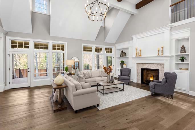 Beautiful living room in new traditional style luxury home. Feat