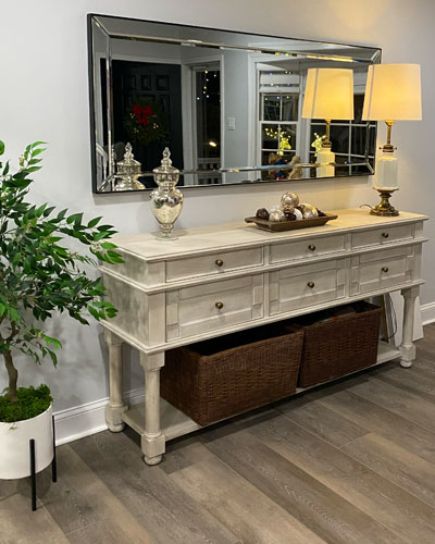 entryway console table with a mirror